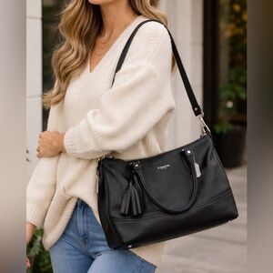 Coach Woman’s purse bag black silver zippers adjustable strap travel luxury